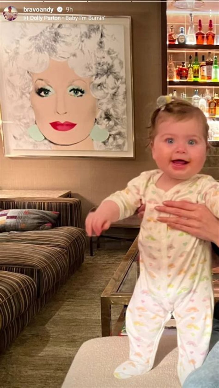 
Andy Cohen Shares Adorable Photo of Daughter Lucy, 7 Months, Smiling in Her Rainbow Pajamas 