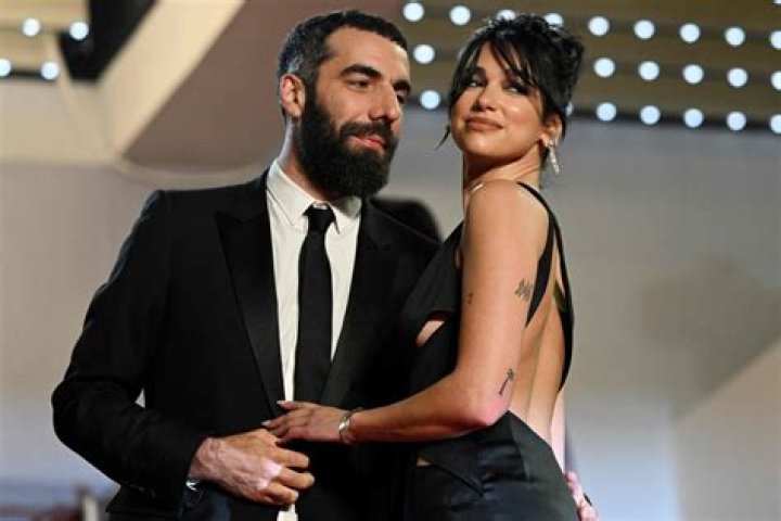 
Dua Lipa Confirms Romain Gavras Dating Rumor By Holding Hands In Paris 