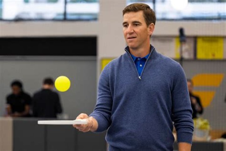 
Eli Manning Says He’s a ‘Little Bit Better’ at Pickleball Than Brother Peyton: ‘It Gets Very Competitive’ 