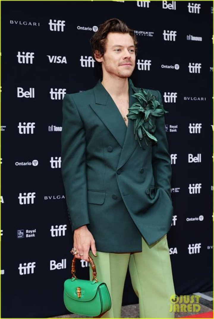 
Harry Styles Looks Dapper in a Black Gucci Suit at ‘My Policeman’ Premiere 