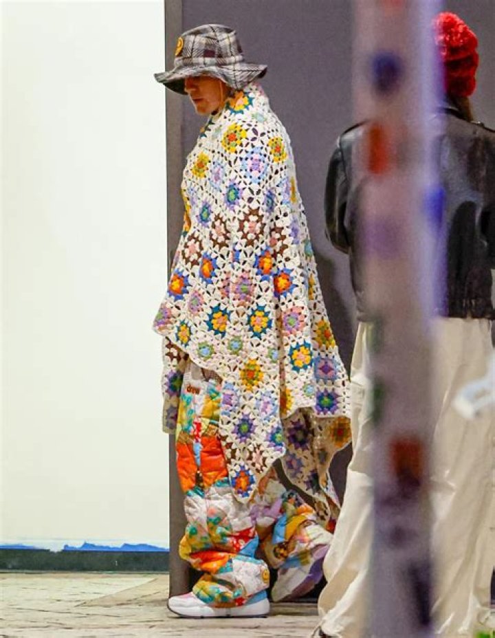 
Justin Bieber Cozies Up in a Crochet Blanket for L.A. Dinner Date Night with Wife Hailey Bieber 