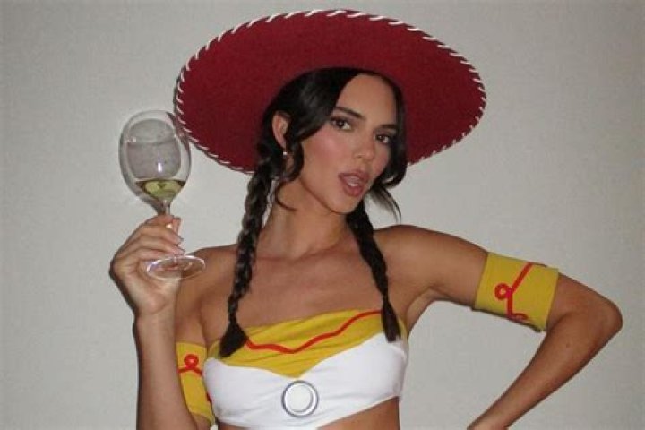 
Kendall Jenner Exposes Her Backside in Denim Chaps for ‘Toy Story’ Jessie Halloween Costume 