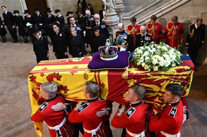 
Queen Elizabeth’s Coffin Brought To Buckingham Palace As Meghan Markle And Prince Harry Join Royals 