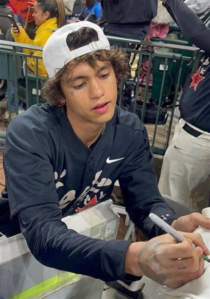 
“When did he get so fine?”: Fans gush over Dominic Fike as singer’s baseball uniform transformation goes viral 